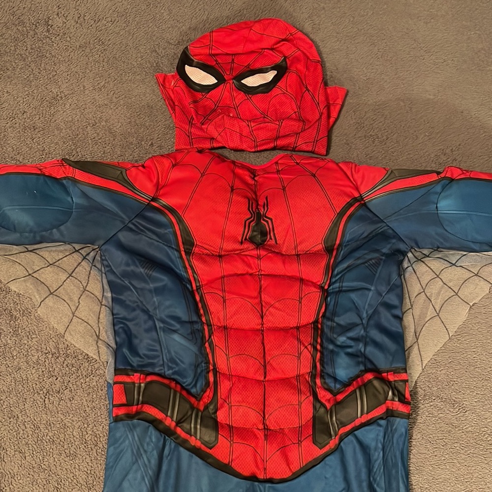 Spider-Man muscle costume with mask and gloves. Like new. Never worn. Boys med.